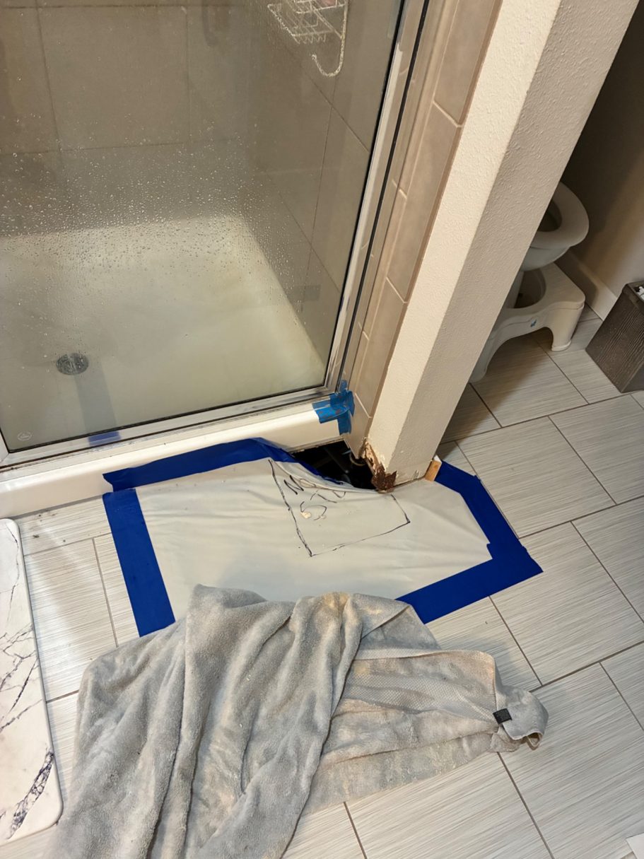 Hole in floor from leaking shower Complete Bathroom Remodel