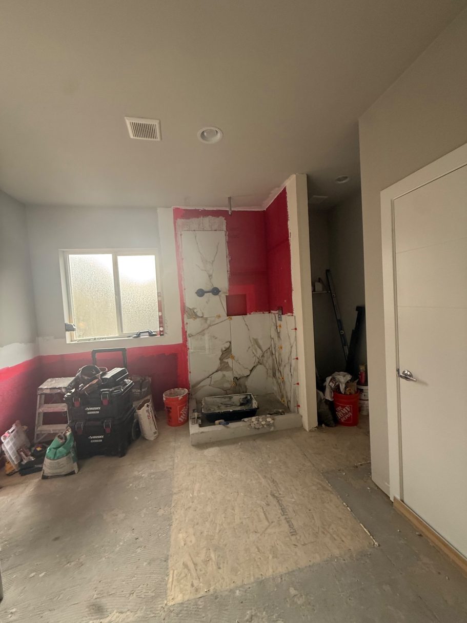 Tile is about half way done Complete Bathroom Remodel