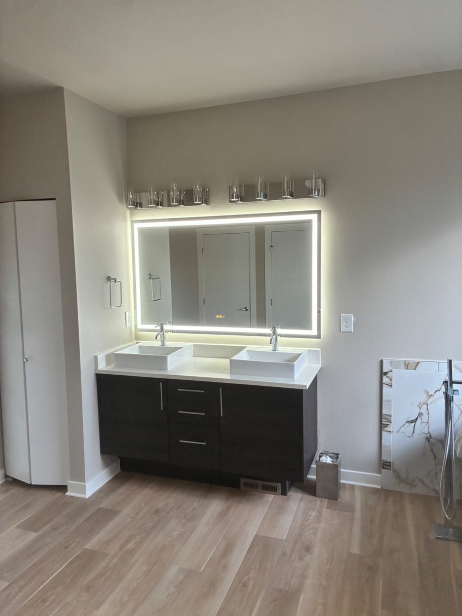 New LED anti-fog mirror and new vanity lights. Complete Bathroom Remodel